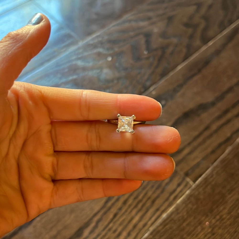 Just a basic silver band with a diamond